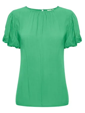 Blusa donna verde con bottone sul retro